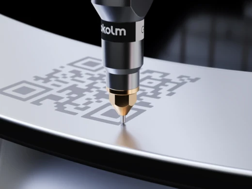 The Gravfix engraving system from Pokolm mills a QR code into a component.