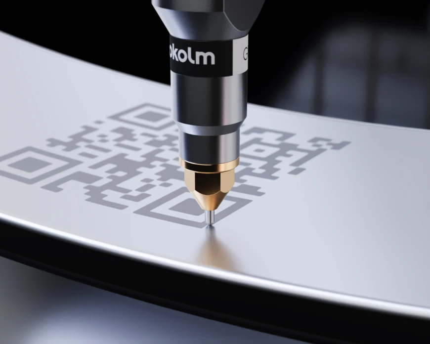 The Gravfix engraving system from Pokolm mills a QR code into a component.